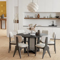 Tavolo da pranzo rotondo in legno massello nero/legno, gambe in rattan, 6 posti a sedere