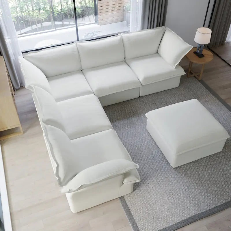 Divano componibile a L a 5 posti bianco/beige/nero, con poggiapiedi opzionale