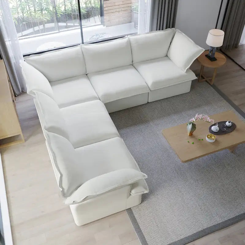 Divano componibile a L a 5 posti bianco/beige/nero, con poggiapiedi opzionale