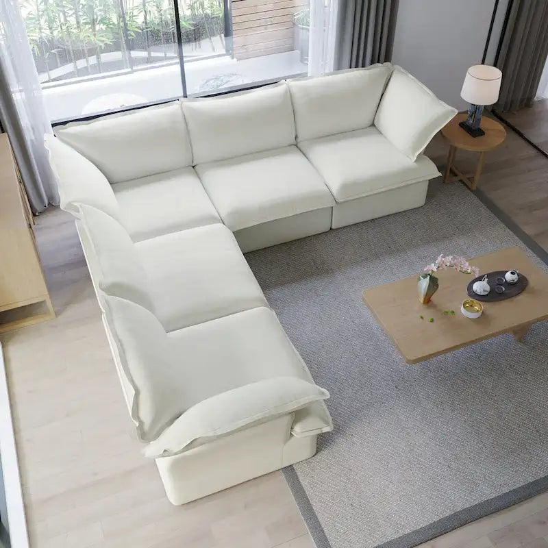 Divano componibile a L a 5 posti bianco/beige/nero, con poggiapiedi opzionale