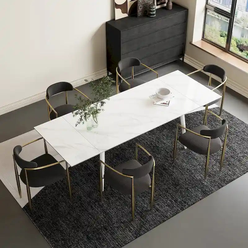 Set da pranzo con tavolo allungabile in pietra sinterizzata, gambe e sedie bianche/nere, per 6-8 persone