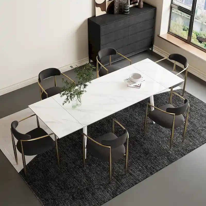 Set da pranzo con tavolo allungabile in pietra sinterizzata, gambe e sedie bianche/nere, per 6-8 persone