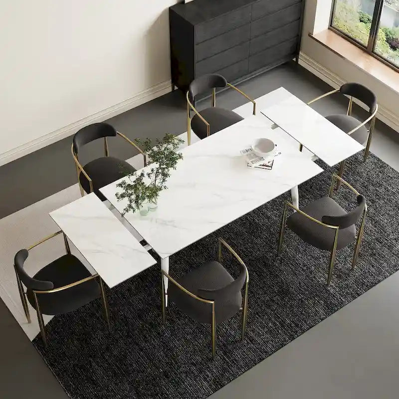 Set da pranzo con tavolo allungabile in pietra sinterizzata, gambe e sedie bianche/nere, per 6-8 persone