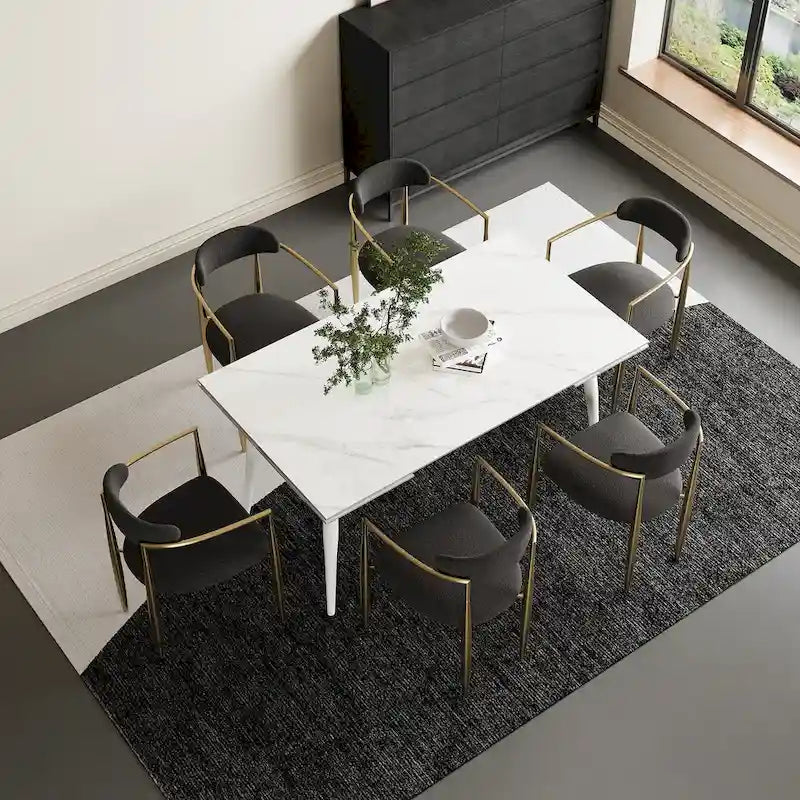 Set da pranzo con tavolo allungabile in pietra sinterizzata, gambe e sedie bianche/nere, per 6-8 persone