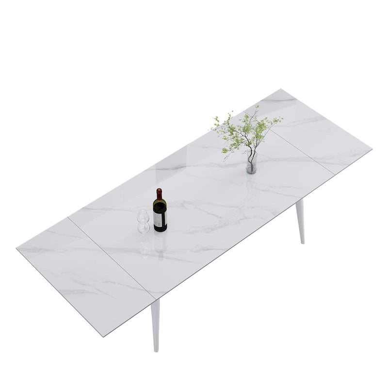 Set da pranzo con tavolo allungabile in pietra sinterizzata, gambe e sedie bianche/nere, per 6-8 persone
